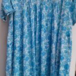 Dolma's Quinn dress in blue floral print. Flowy cool travel fave, light cotton for staying cool.