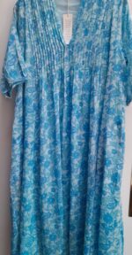 Dolma's Quinn dress in blue floral print. Flowy cool travel fave, light cotton for staying cool.