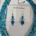 Handmade necklace with five strands of turquoise crystals by California artist Carol Kent.