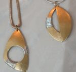 Two new wire wrapped Marjorie Baer necklaces in playful classic design. Mixed metals.