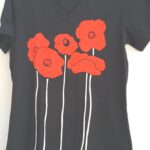 Ladies v-neck black poppy short sleeve t-shirt with orange flower silkscreen by Marushka USA made fitted style.