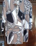 Mandarin collar in a mocha print. Earth tone classic. Outstanding for the holidays and all year.